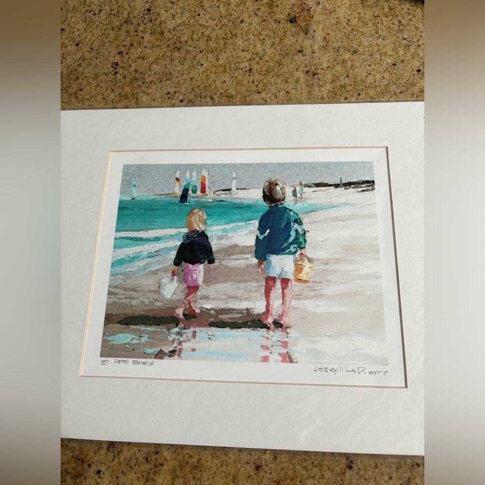 Two 11 by 14 inch matted prints.